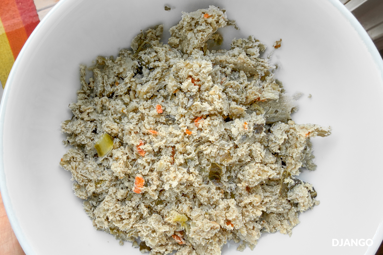 Close up photo of The Farmer's Dog Chicken and Grain fresh dog food recipe in a white dog bowl